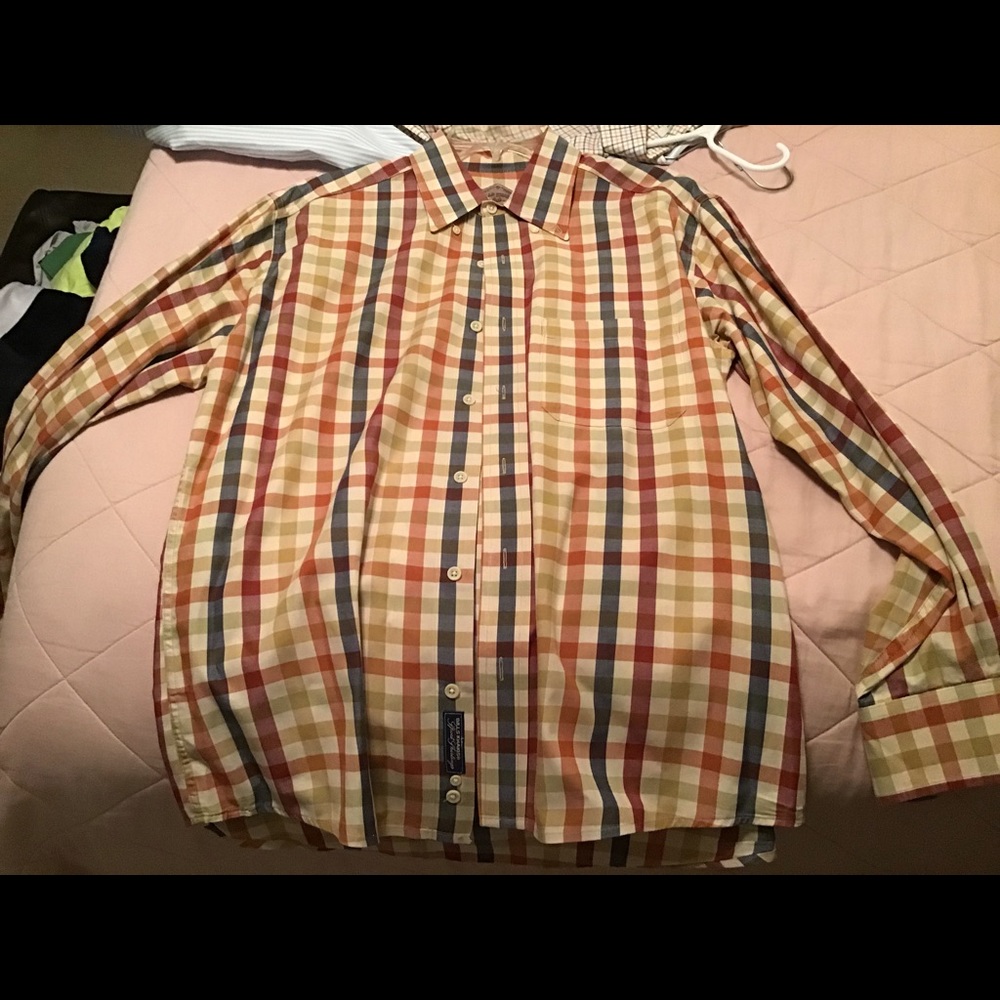 Bill’s khaki button down shirt